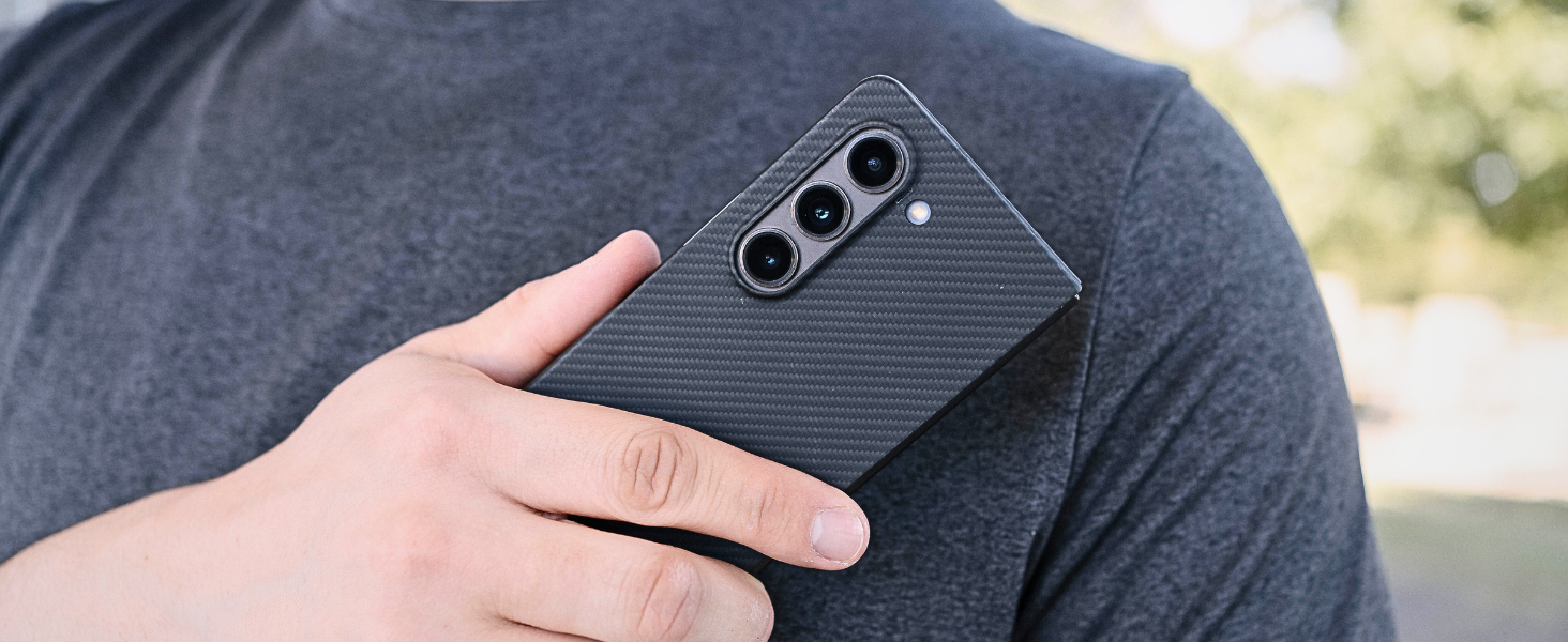 a man holding galaxy z fold 5 case in aramid fiber case